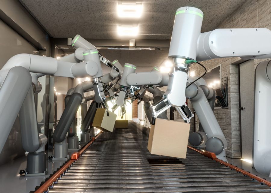 Robot colaborativo en almacén logístico manipulando cajas mediante brazo robótico, ilustrando la automatización en la preparación de pedidos.